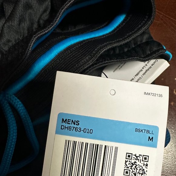 mens nike loose fit knee length shorts